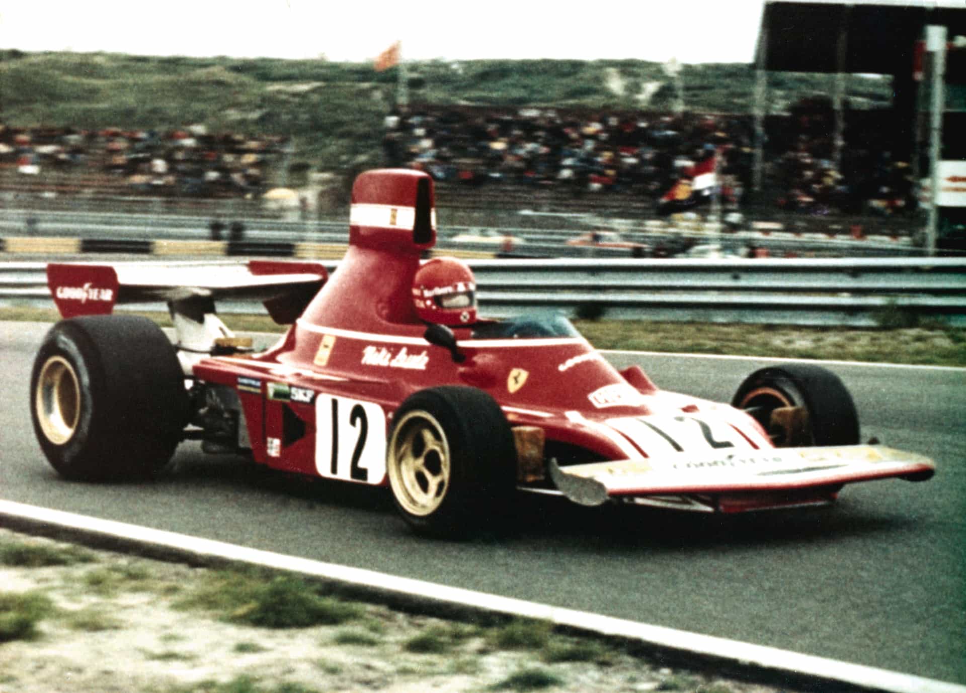 Niki Lauda driving his #12 Ferrar F1 car