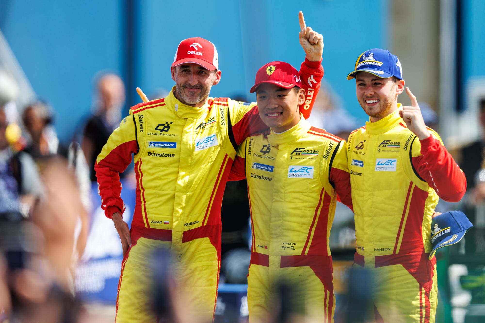 Ferrari 499P driver Phil Hanson alongside his teammates Robert Kubica and Yifei Ye