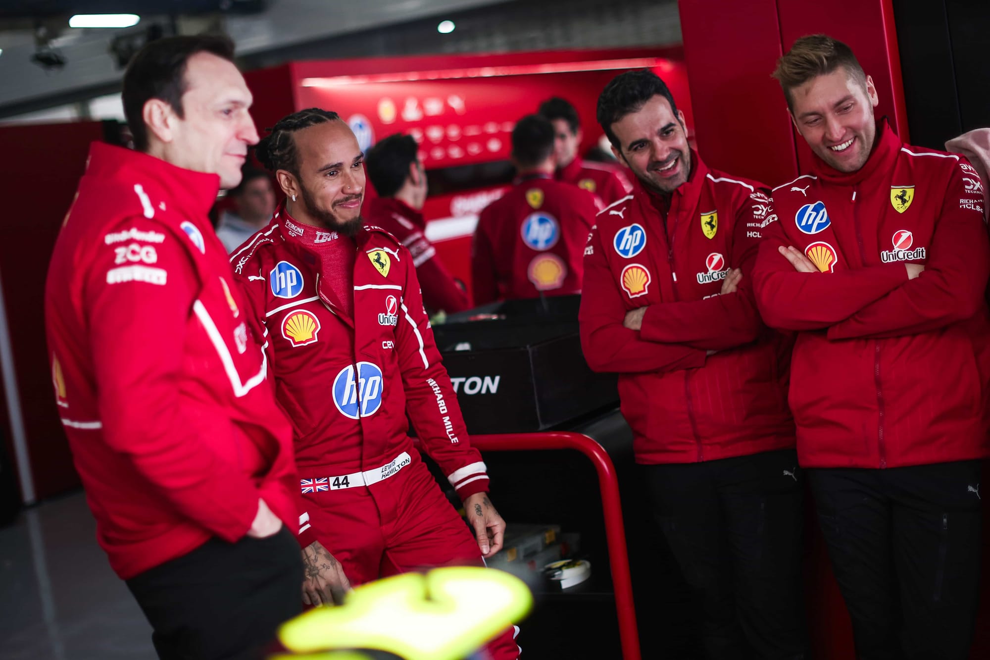 Lewis Hamilton standing next to his former Ferrari race engineer Riccardo Adami