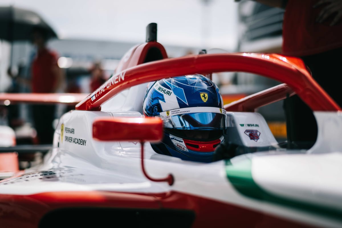F3 driver Tuukka Taponen sitting in his car ahead of a race