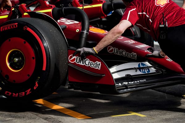 Charles Leclerc's Ferrari being pushed into the garage at the F1 Chinese Grand Prix in Shangh